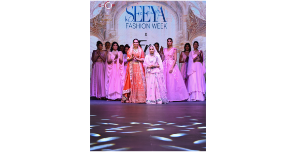 Sayeeda Khan receiving award at Seeya Fashion Week Delhi 2024
